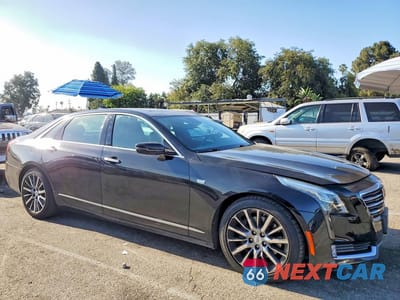 Czwarte zdjęcie samochodu z boku: 2016 CADILLAC CT6 PREMIUM VIN:1G6KF5RS7GU160973 - miniatura