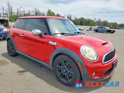 Czwarte zdjęcie samochodu z boku: 2009 MINI COOPER S VIN:WMWMF73589TW85129 - miniatura