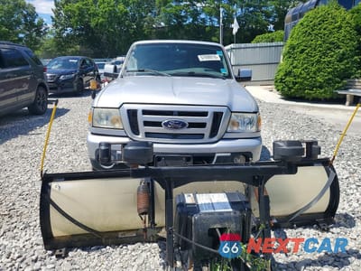 Piąte zdjęcie samochodu w środku: 2010 FORD RANGER SUPER CAB VIN:1FTLR4FE0APA09660 - miniatura