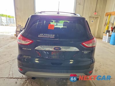 Zdjęcie 6 z 13 samochodu: 2014 FORD ESCAPE TITANIUM VIN:1FMCU9J98EUA62664 - miniatura