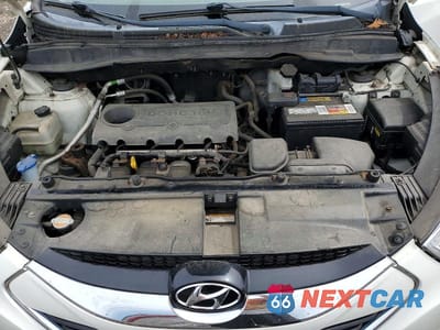 Zdjęcie 11 z 12 samochodu: 2012 HYUNDAI TUCSON LIMITED VIN:KM8JUCAC0CU405268 - miniatura
