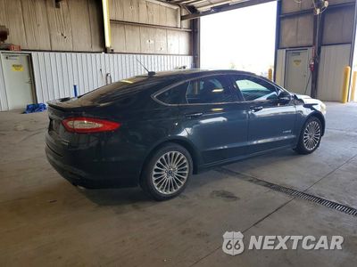 Piąte zdjęcie samochodu w środku: 2014 FORD FUSION TITANIUM HEV VIN:3FA6P0RUXER168348 - miniatura