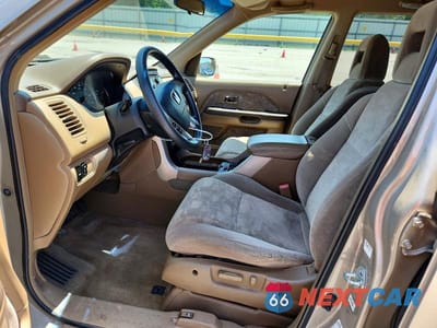 Zdjęcie 7 z 14 samochodu: 2003 HONDA PILOT EX VIN:2HKYF18433H566241 - miniatura