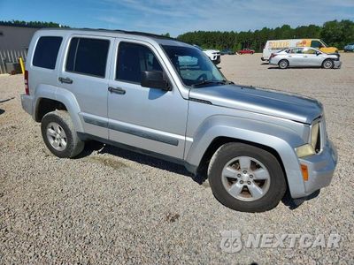 Czwarte zdjęcie samochodu z boku: 2010 JEEP LIBERTY SPORT VIN:1J4PP2GK5AW112315 - miniatura