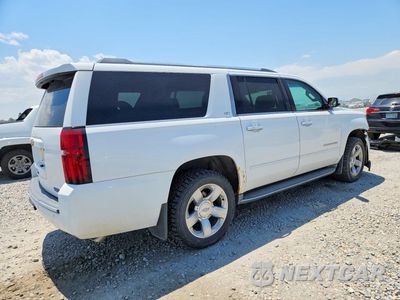 Trzecie zdjęcie samochodu z tyłu: 2015 CHEVROLET SUBURBAN K1500 LTZ VIN:1GNSKKKCXFR156189 - miniatura