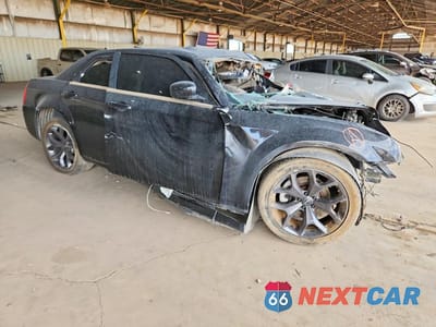 Czwarte zdjęcie samochodu z boku: 2006 CHRYSLER 300C VIN:2C3KA63H36H353321 - miniatura
