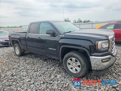 Czwarte zdjęcie samochodu z boku: 2018 GMC SIERRA K1500 SLE VIN:2GTV2MEC6J1108543 - miniatura