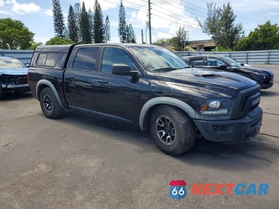 Czwarte zdjęcie samochodu z boku: 2016 RAM 1500 REBEL VIN:1C6RR7YT8GS181584 - miniatura