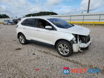 Czwarte zdjęcie samochodu z boku: 2016 FORD EDGE SEL VIN:2FMPK4J93GBB88367 - miniatura