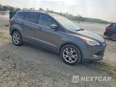 Czwarte zdjęcie samochodu z boku: 2016 FORD ESCAPE TITANIUM VIN:1FMCU9JX0GUA25609 - miniatura