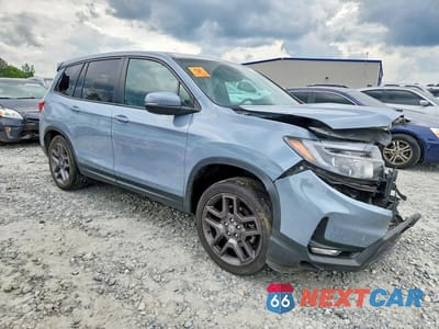 Czwarte zdjęcie samochodu z boku: 2023 HONDA PASSPORT EXL VIN:5FNYF8H57PB019253 - miniatura