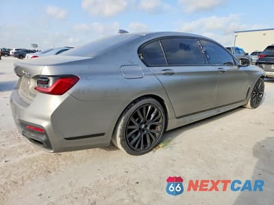 Trzecie zdjęcie samochodu z tyłu: 2022 BMW 750 XI VIN:WBA7U2C03NCJ48155 - miniatura