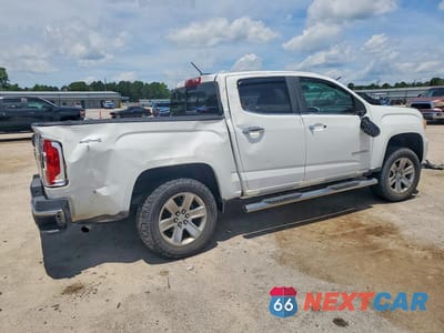 Trzecie zdjęcie samochodu z tyłu: 2016 GMC CANYON SLT VIN:1GTG6DE38G1279547 - miniatura