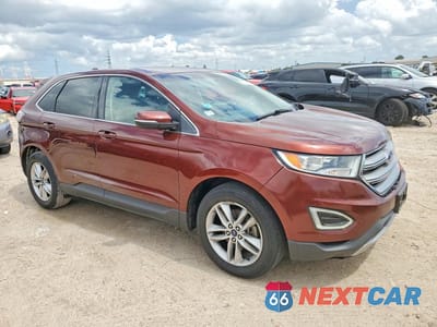 Czwarte zdjęcie samochodu z boku: 2016 FORD EDGE SEL VIN:2FMPK3J90GBC36658 - miniatura