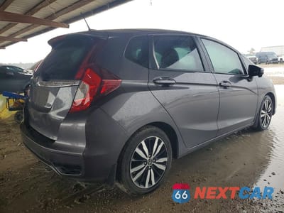 Trzecie zdjęcie samochodu z tyłu: 2018 HONDA FIT EX VIN:3HGGK5H89JM719876 - miniatura