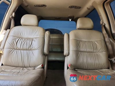Zdjęcie 10 z 13 samochodu: 2002 HONDA ODYSSEY EX VIN:2HKRL18602H519343 - miniatura