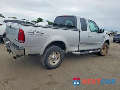 Trzecie zdjęcie samochodu z tyłu: 2000 FORD F150 VIN:1FTRX18WXYNC28359 - miniatura