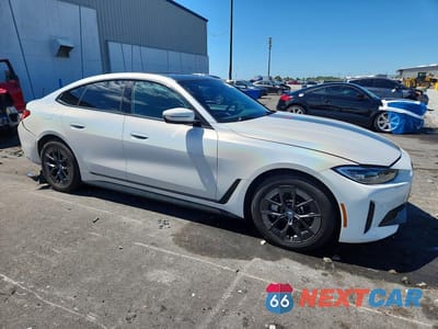 Czwarte zdjęcie samochodu z boku: 2023 BMW I4 EDRIVE 40 VIN:WBY73AW05PFN86882 - miniatura
