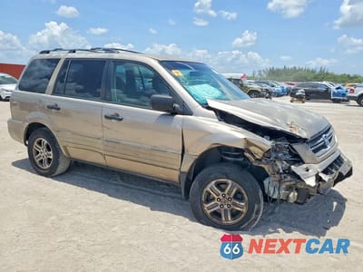 Czwarte zdjęcie samochodu z boku: 2004 HONDA PILOT EXL VIN:2HKYF18614H618453 - miniatura