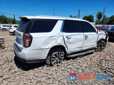 Trzecie zdjęcie samochodu z tyłu: 2022 CHEVROLET TAHOE K1500 LT VIN:1GNSKNKD3NR210151 - miniatura