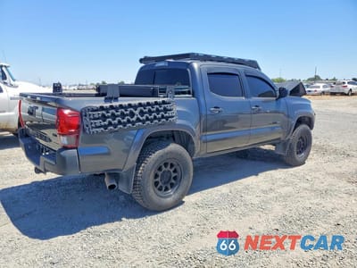 Trzecie zdjęcie samochodu z tyłu: 2018 TOYOTA TACOMA SR5 V6 VIN:3TMAZ5CN8JM053574 - miniatura
