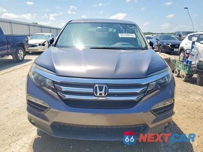 Piąte zdjęcie samochodu w środku: 2016 HONDA PILOT EXL VIN:5FNYF6H8XGB076464 - miniatura