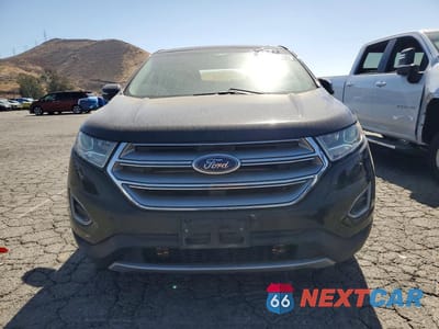 Piąte zdjęcie samochodu w środku: 2018 FORD EDGE TITANIUM VIN:2FMPK4K83JBC32915 - miniatura