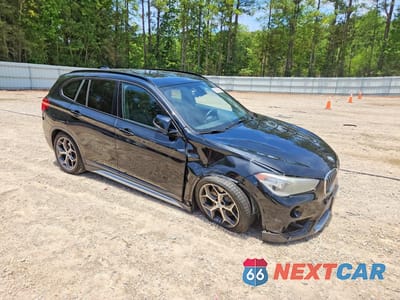 Czwarte zdjęcie samochodu z boku: 2017 BMW X1 SDRIVE28I VIN:WBXHU7C35H5H37964 - miniatura