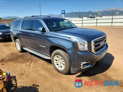 Czwarte zdjęcie samochodu z boku: 2019 GMC YUKON XL K1500 SLT VIN:1GKS2GKC8KR375513 - miniatura