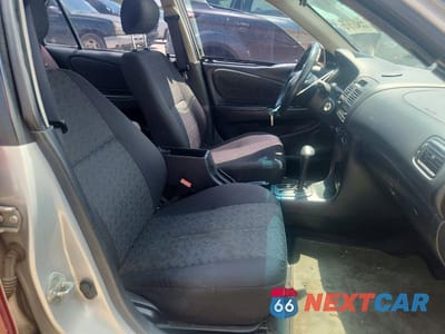 Zdjęcie 7 z 12 samochodu: 2001 TOYOTA COROLLA S VIN:1NXBR12E11Z509873 - miniatura