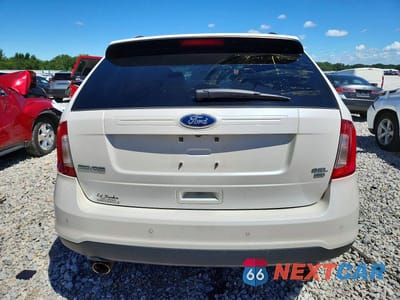 Zdjęcie 6 z 13 samochodu: 2014 FORD EDGE SEL VIN:2FMDK4JC6EBB85054 - miniatura