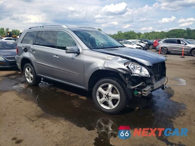 Czwarte zdjęcie samochodu z boku: 2012 MERCEDES-BENZ GL 450 4MATIC VIN:4JGBF7BE8CA789677 - miniatura