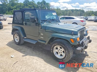 Czwarte zdjęcie samochodu z boku: 2004 JEEP WRANGLER / TJ SAHARA VIN:1J4FA59S64P768436 - miniatura