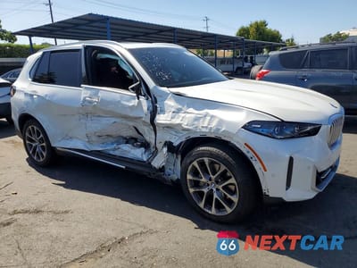 Czwarte zdjęcie samochodu z boku: 2026 BMW X5 XDRIVE40I VIN:5UX23EU01T9098011 - miniatura