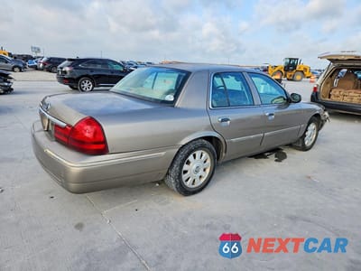 Trzecie zdjęcie samochodu z tyłu: 2004 MERCURY GRAND MARQUIS LS VIN:2MEFM75W54X656611 - miniatura