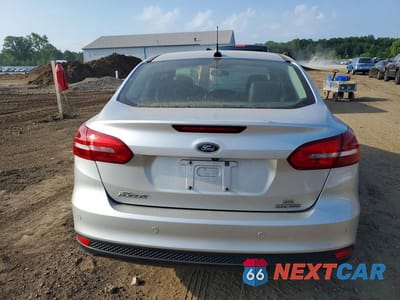 Zdjęcie 6 z 12 samochodu: 2016 FORD FOCUS SE VIN:1FADP3F22GL224747 - miniatura