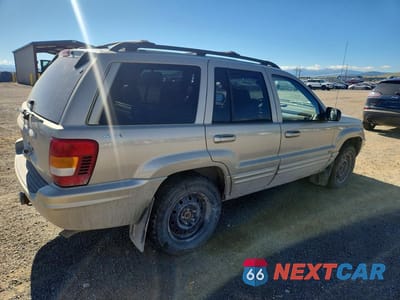 Trzecie zdjęcie samochodu z tyłu: 2001 JEEP GRAND CHEROKEE LIMITED VIN:1J4GW58N01C627348 - miniatura