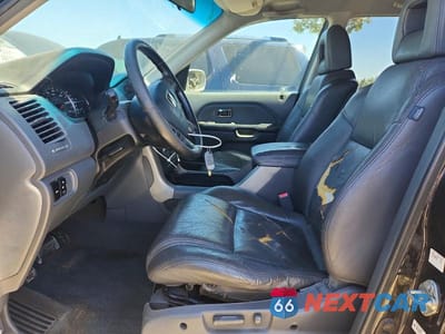 Zdjęcie 7 z 13 samochodu: 2003 HONDA PILOT EXL VIN:2HKYF18723H591058 - miniatura