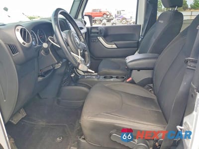 Zdjęcie 7 z 13 samochodu: 2016 JEEP WRANGLER SAHARA VIN:1C4AJWBG2GL143121 - miniatura