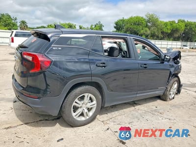 Trzecie zdjęcie samochodu z tyłu: 2023 GMC TERRAIN SLE VIN:3GKALMEG9PL241596 - miniatura