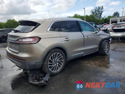 Trzecie zdjęcie samochodu z tyłu: 2019 LINCOLN NAUTILUS RESERVE VIN:2LMPJ6L91KBL35231 - miniatura