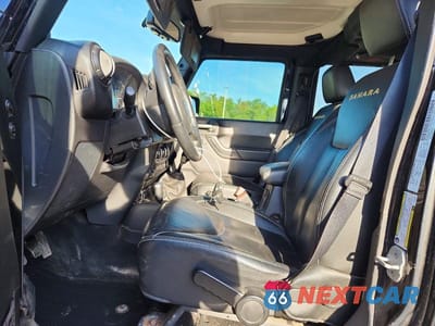 Zdjęcie 7 z 12 samochodu: 2014 JEEP WRANGLER UNLIMITED SAHARA VIN:1C4BJWEG9EL118388 - miniatura
