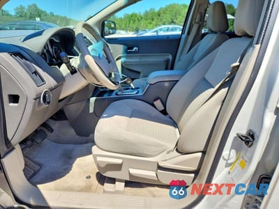 Zdjęcie 7 z 13 samochodu: 2010 FORD EDGE SE VIN:2FMDK3GC5ABB50677 - miniatura