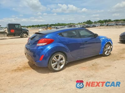 Trzecie zdjęcie samochodu z tyłu: 2016 HYUNDAI VELOSTER BASE VIN:KMHTC6AD5GU248980 - miniatura