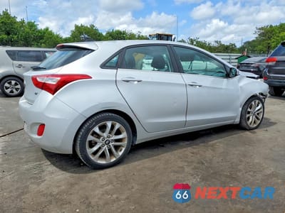 Trzecie zdjęcie samochodu z tyłu: 2013 HYUNDAI ELANTRA GT BASE VIN:KMHD35LE9DU049253 - miniatura