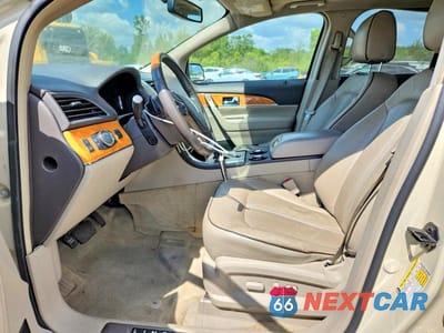 Zdjęcie 7 z 12 samochodu: 2014 LINCOLN MKX VIN:2LMDJ8JK5EBL10129 - miniatura