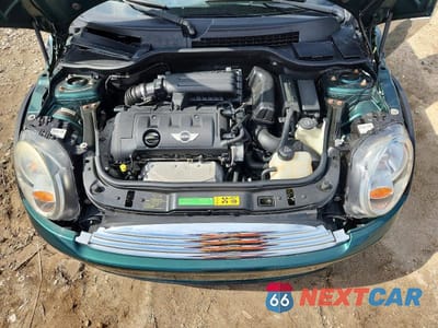 Zdjęcie 11 z 12 samochodu: 2009 MINI COOPER VIN:WMWMR33599TU96070 - miniatura