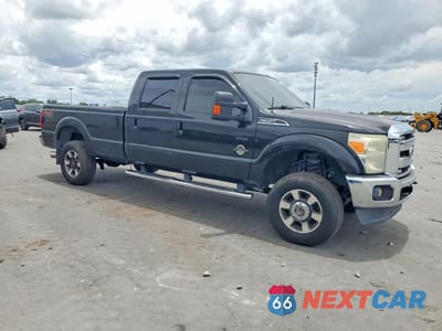 Czwarte zdjęcie samochodu z boku: 2015 FORD F350 SUPER DUTY VIN:1FT8W3BT9FEB02144 - miniatura