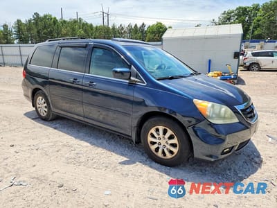 Czwarte zdjęcie samochodu z boku: 2010 HONDA ODYSSEY EXL VIN:5FNRL3H79AB024575 - miniatura