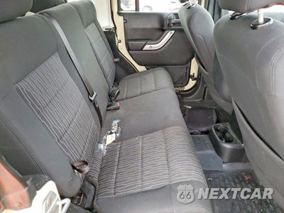 Zdjęcie 10 z 12 samochodu: 2011 JEEP WRANGLER UNLIMITED SAHARA VIN:1J4HA5H15BL627167 - miniatura